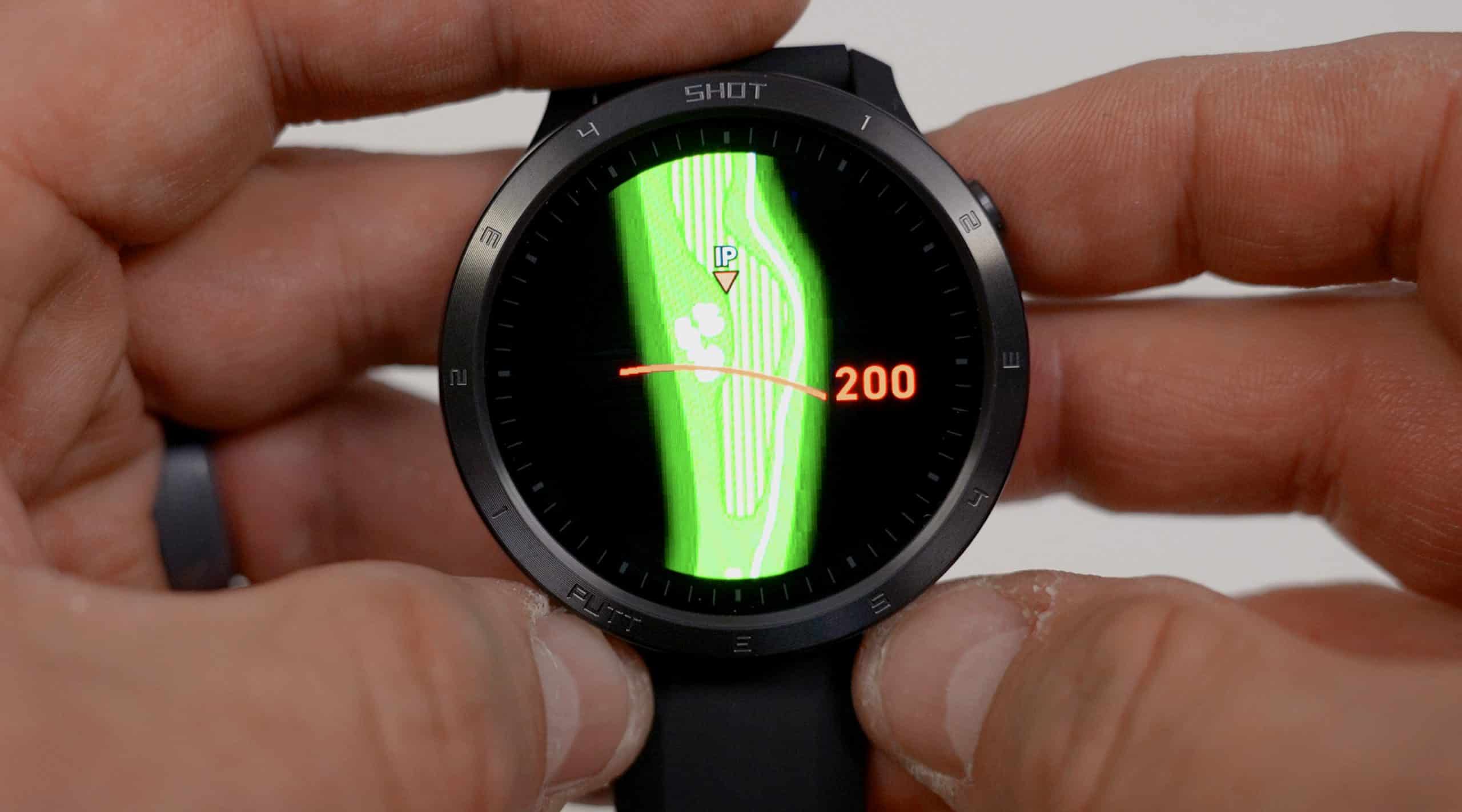 Smartwatch displaying golf course map and distance