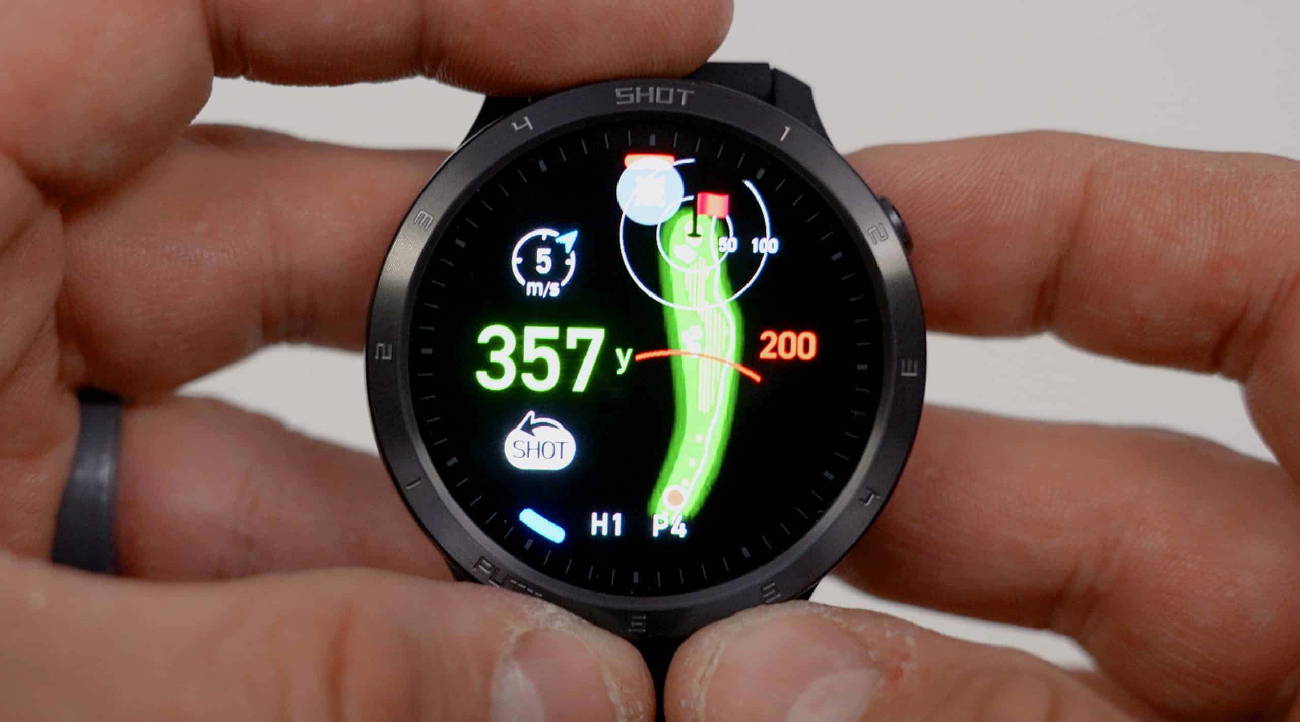 Smartwatch displaying golf course distance data