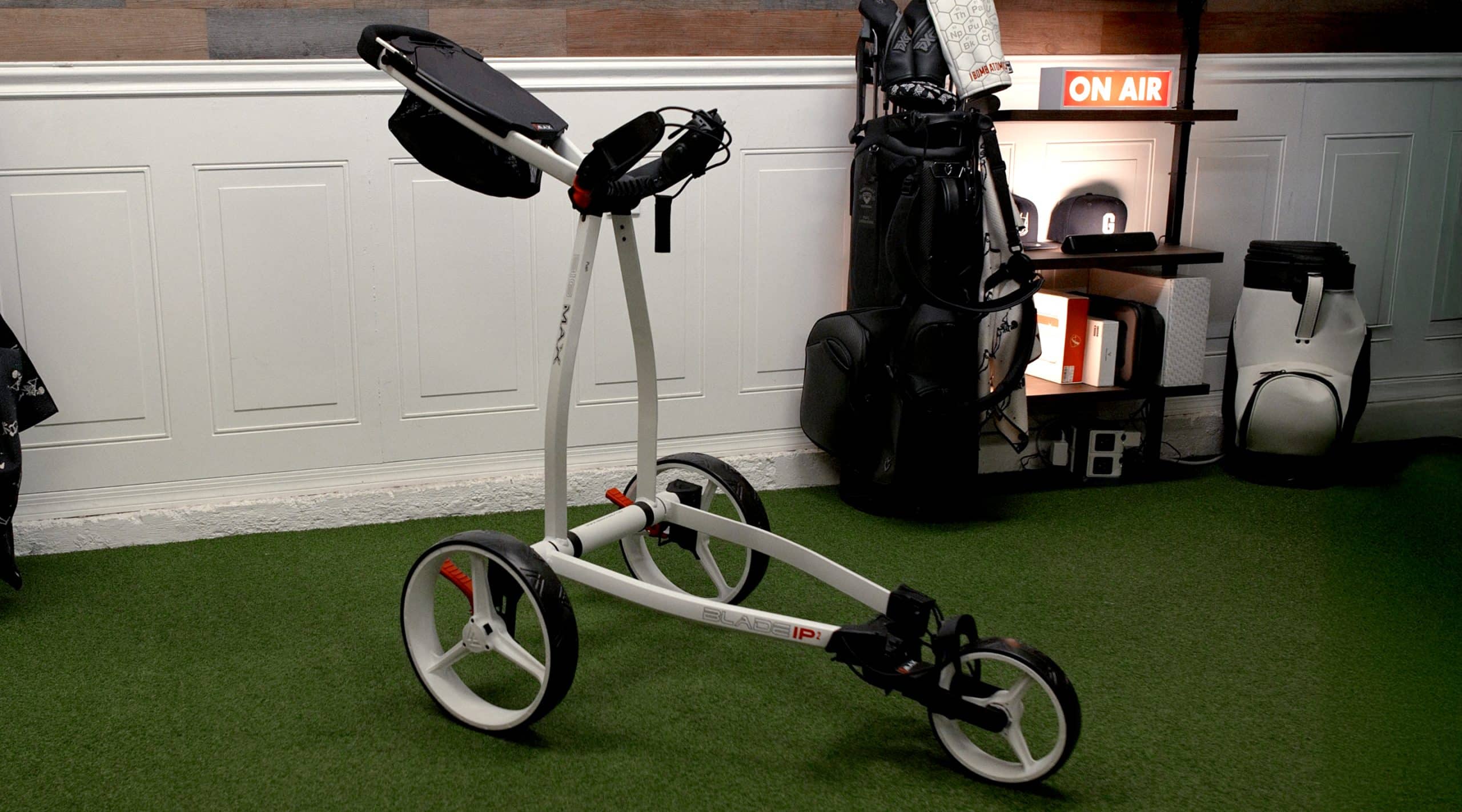 Three-wheel golf push cart indoors