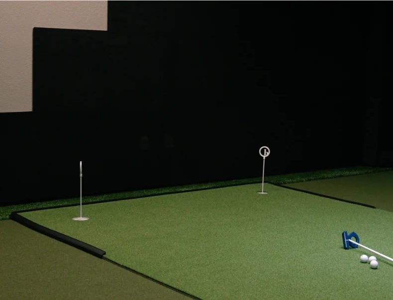 Indoor golf putting green with practice holes