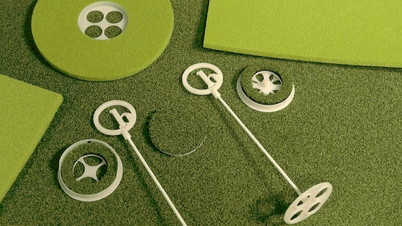 3D printed golf putting training tools on turf