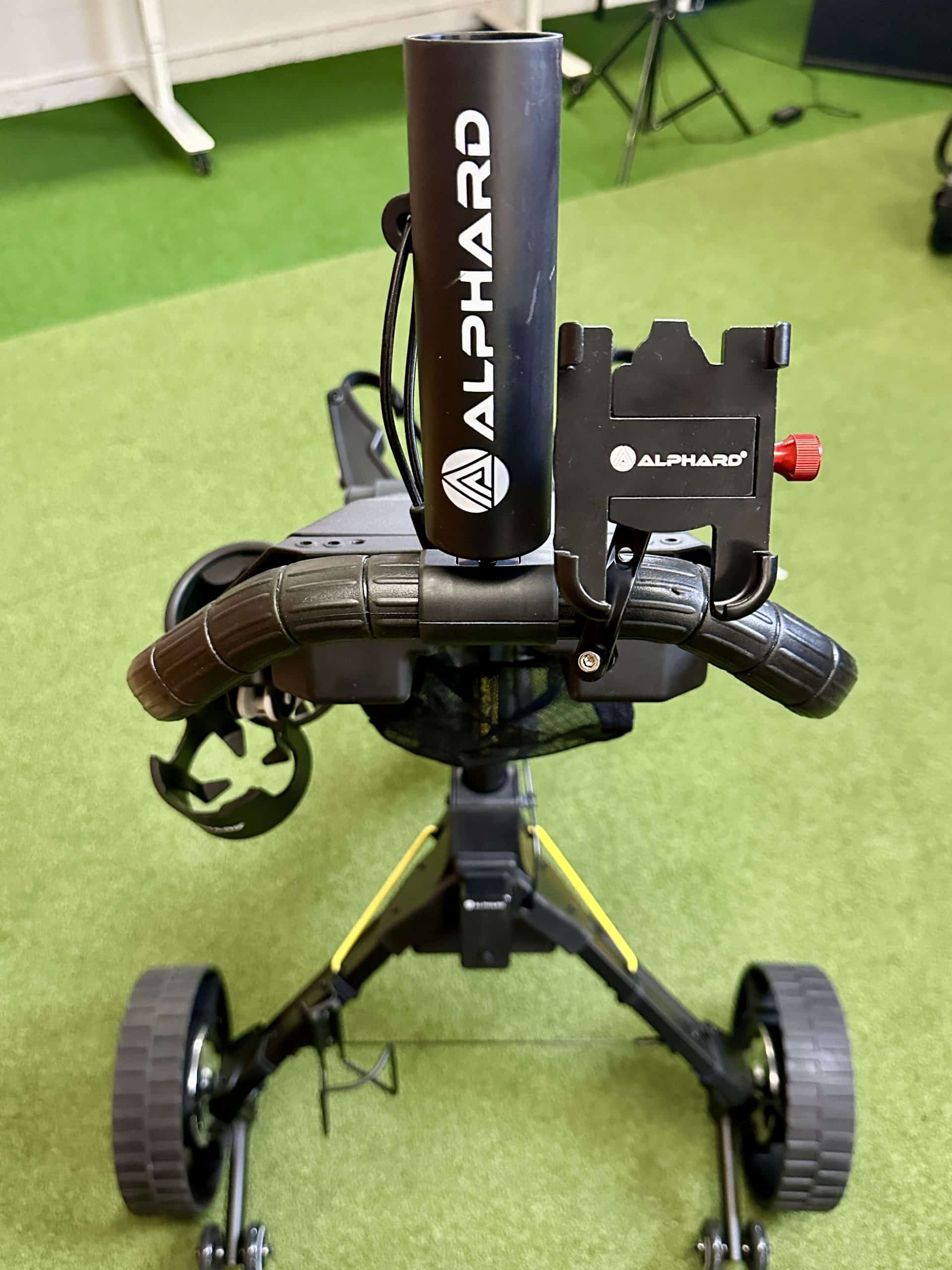 Alphard golf cart attachment on green surface