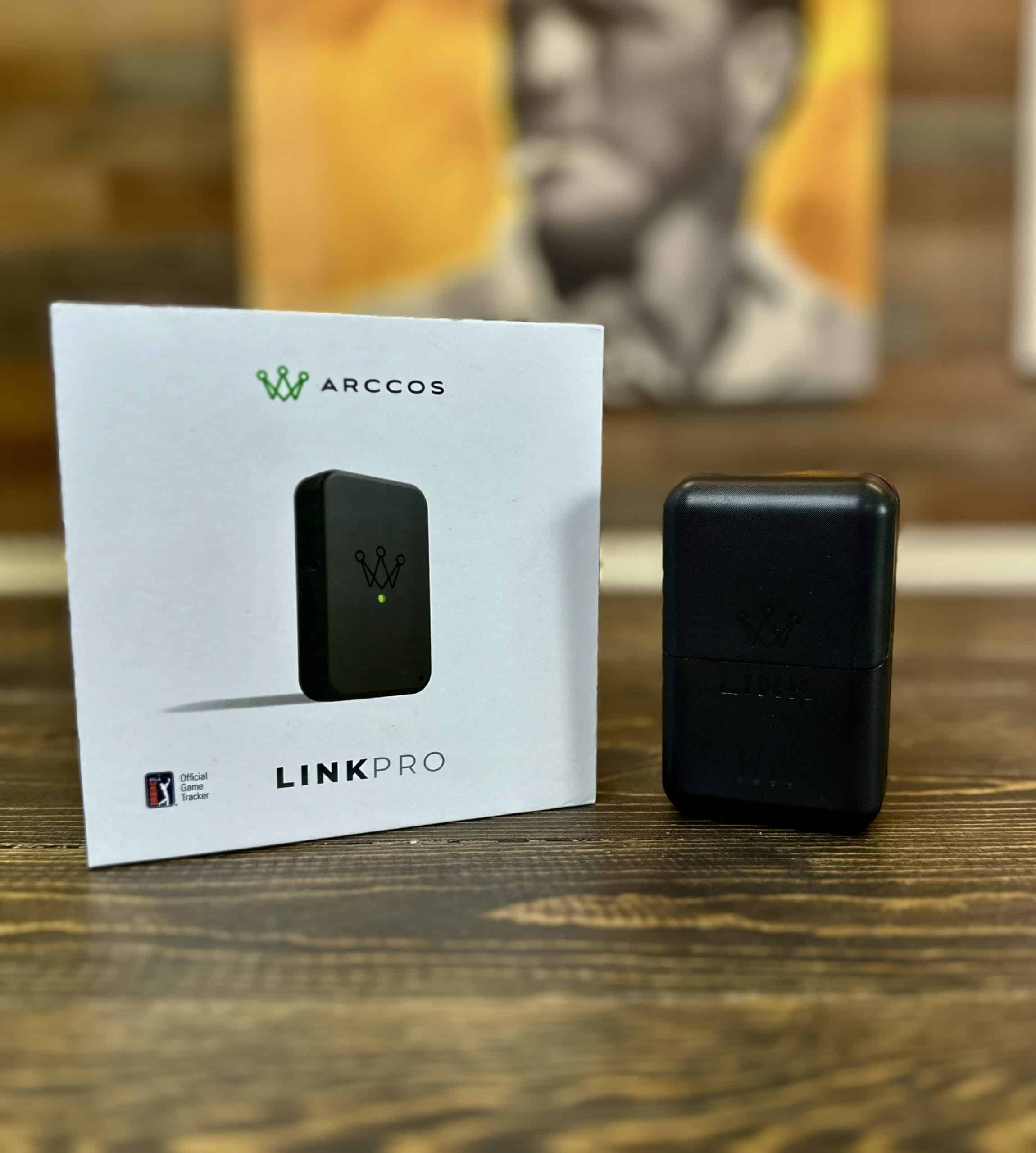 Arccos Link Pro golf tracking device on table