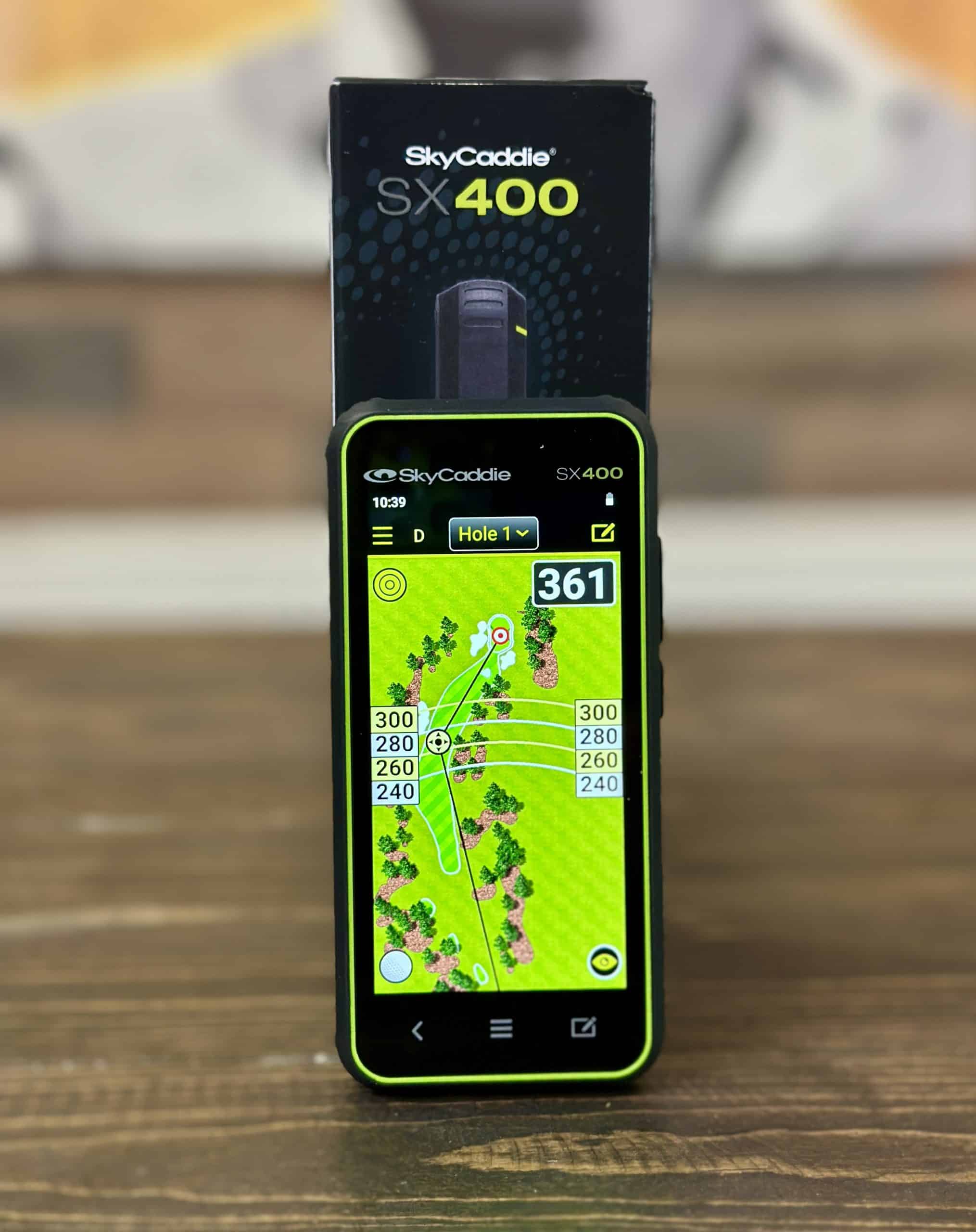 SkyCaddie SX400 golf GPS device on table