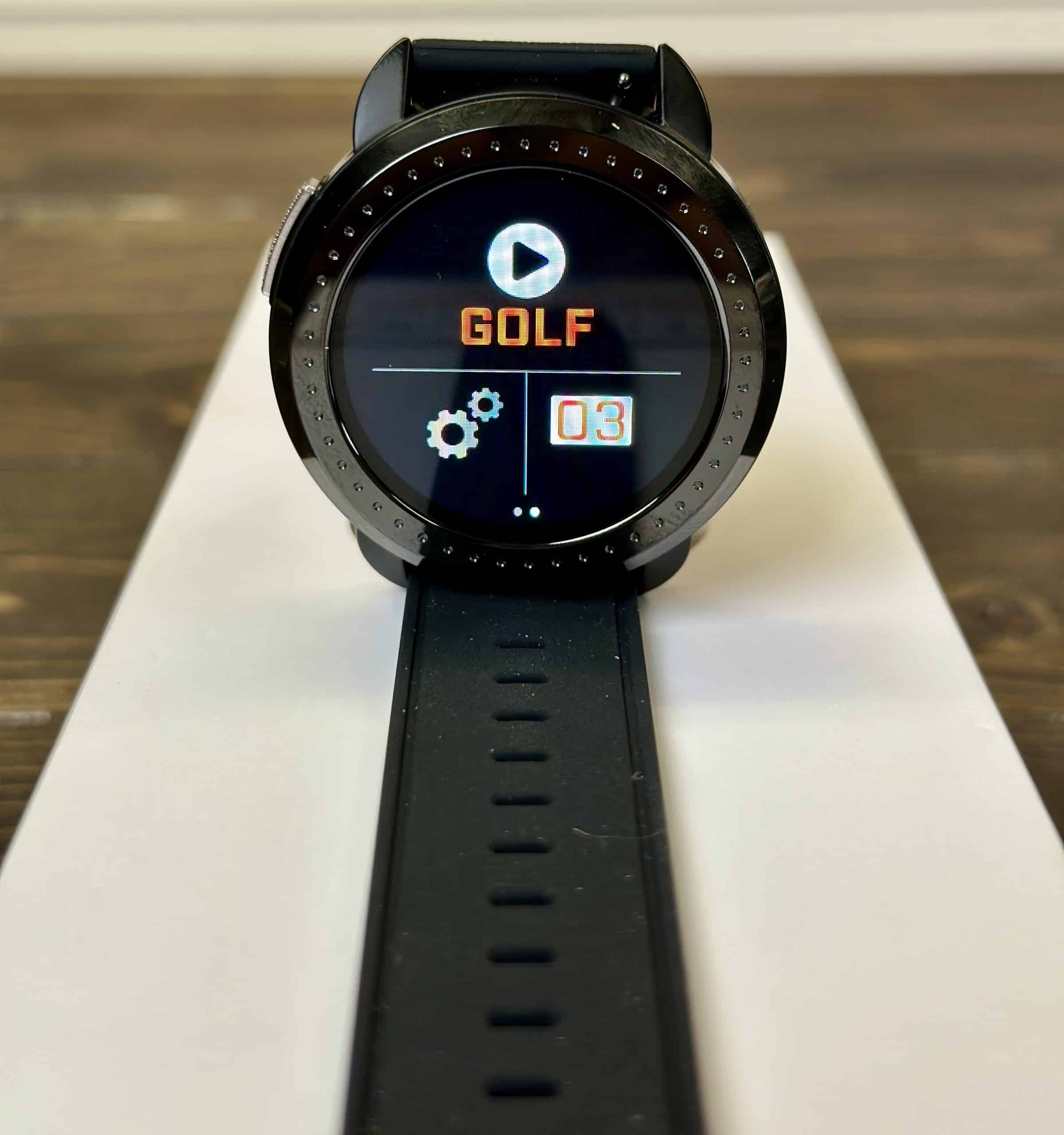 Smartwatch displaying golf mode on screen