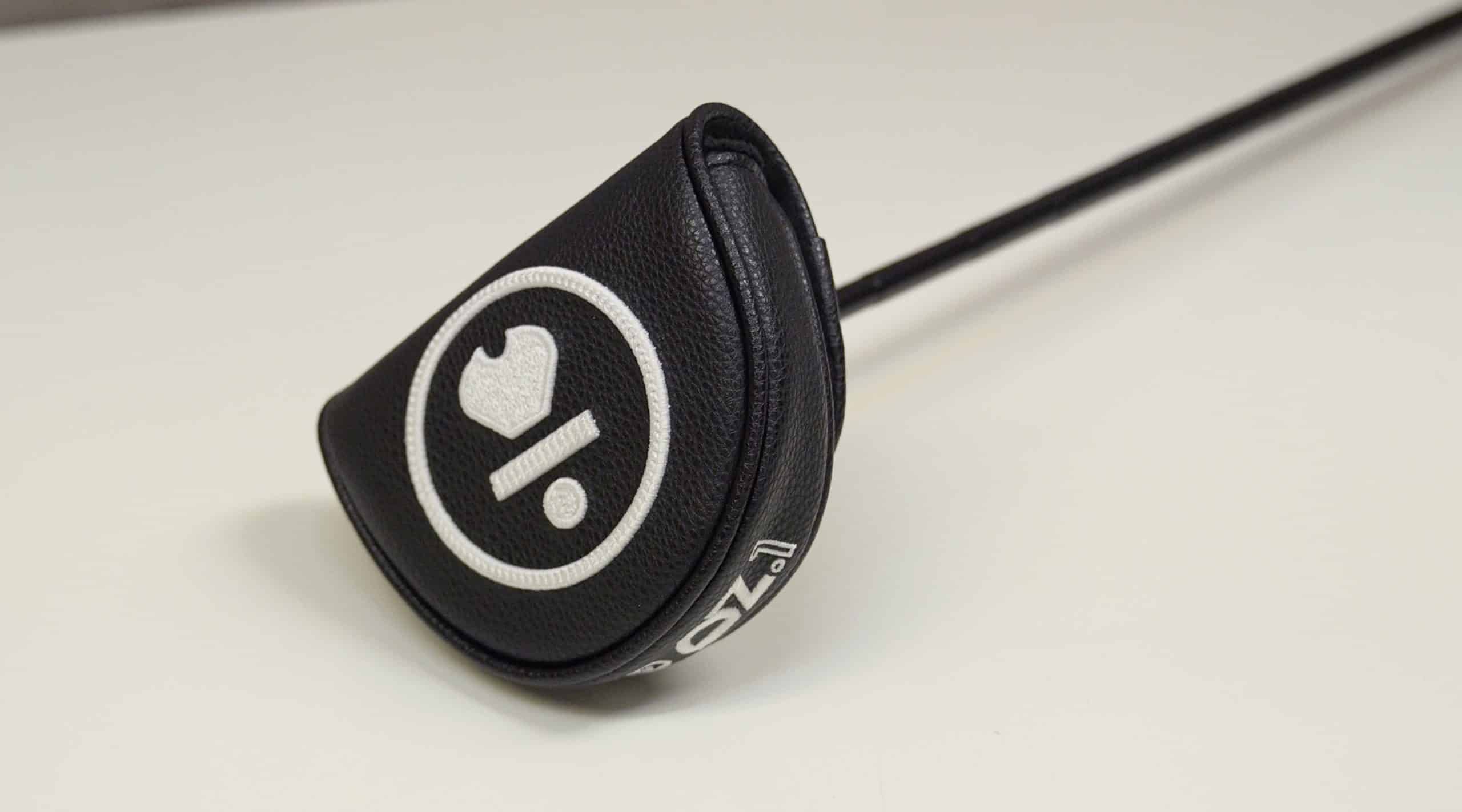 Black golf putter headcover with white logo