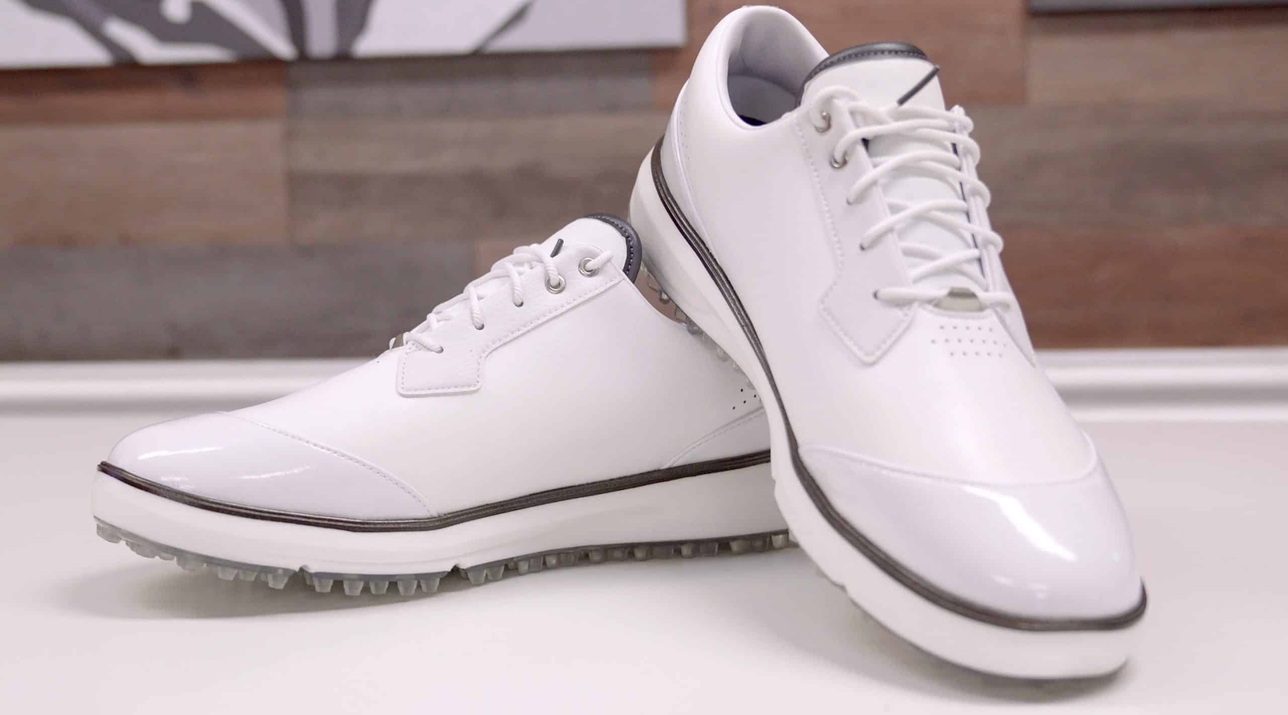 White golf shoes with gray accents