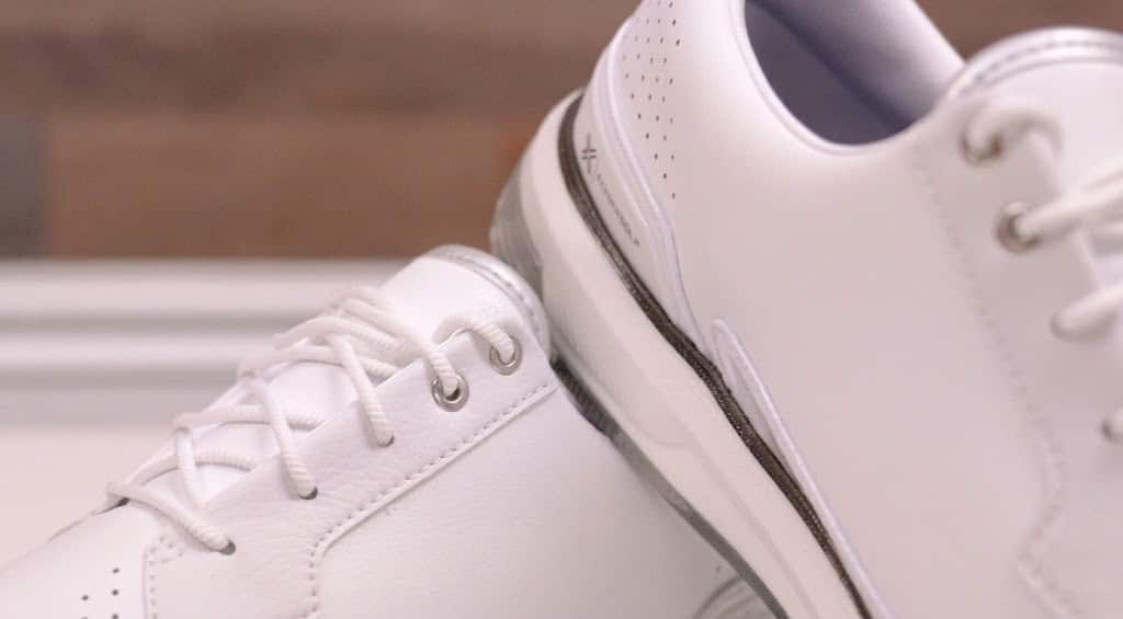 Close-up of white leather sneakers