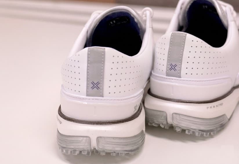White sports shoes with gray accents