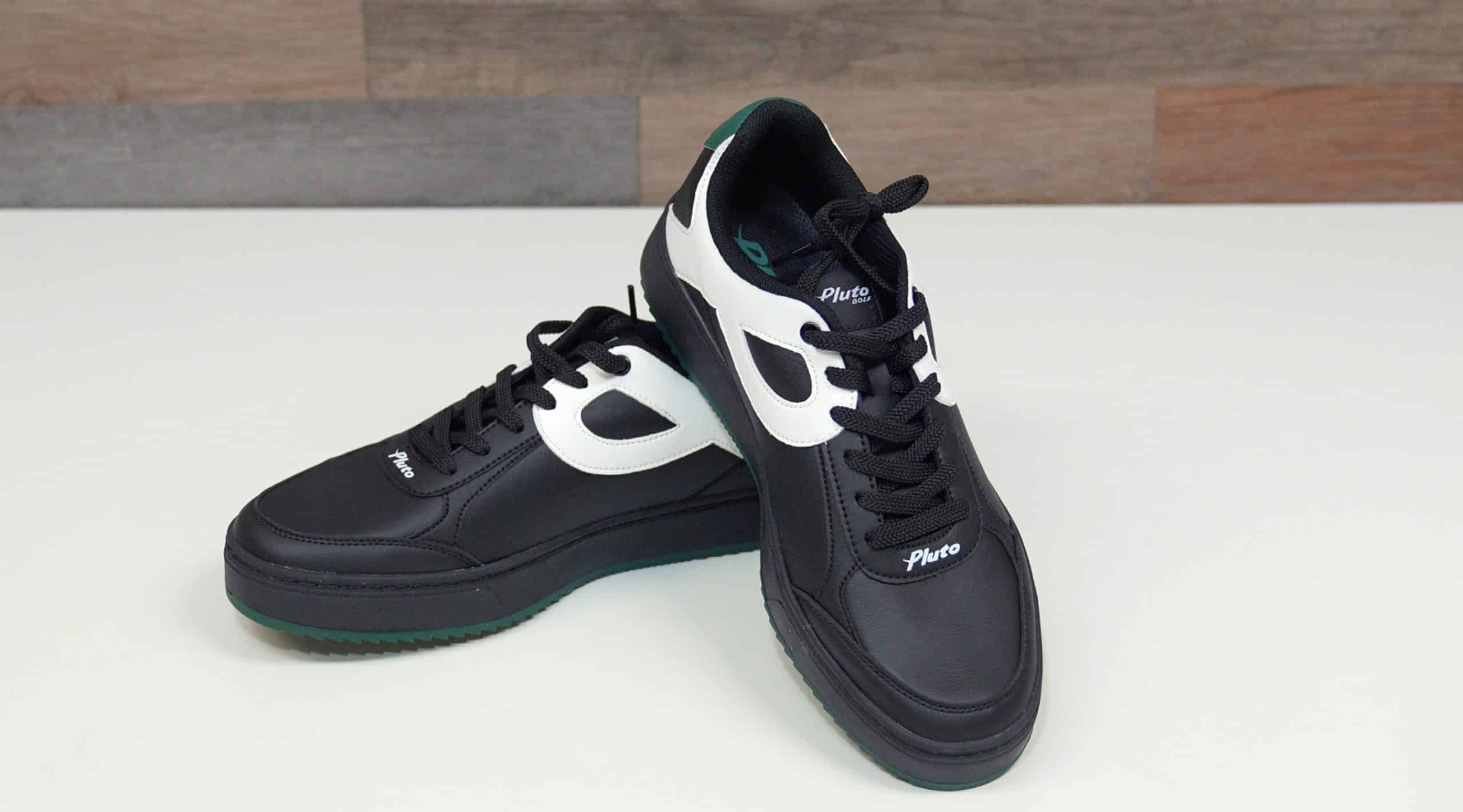 Black and white athletic sneakers on display