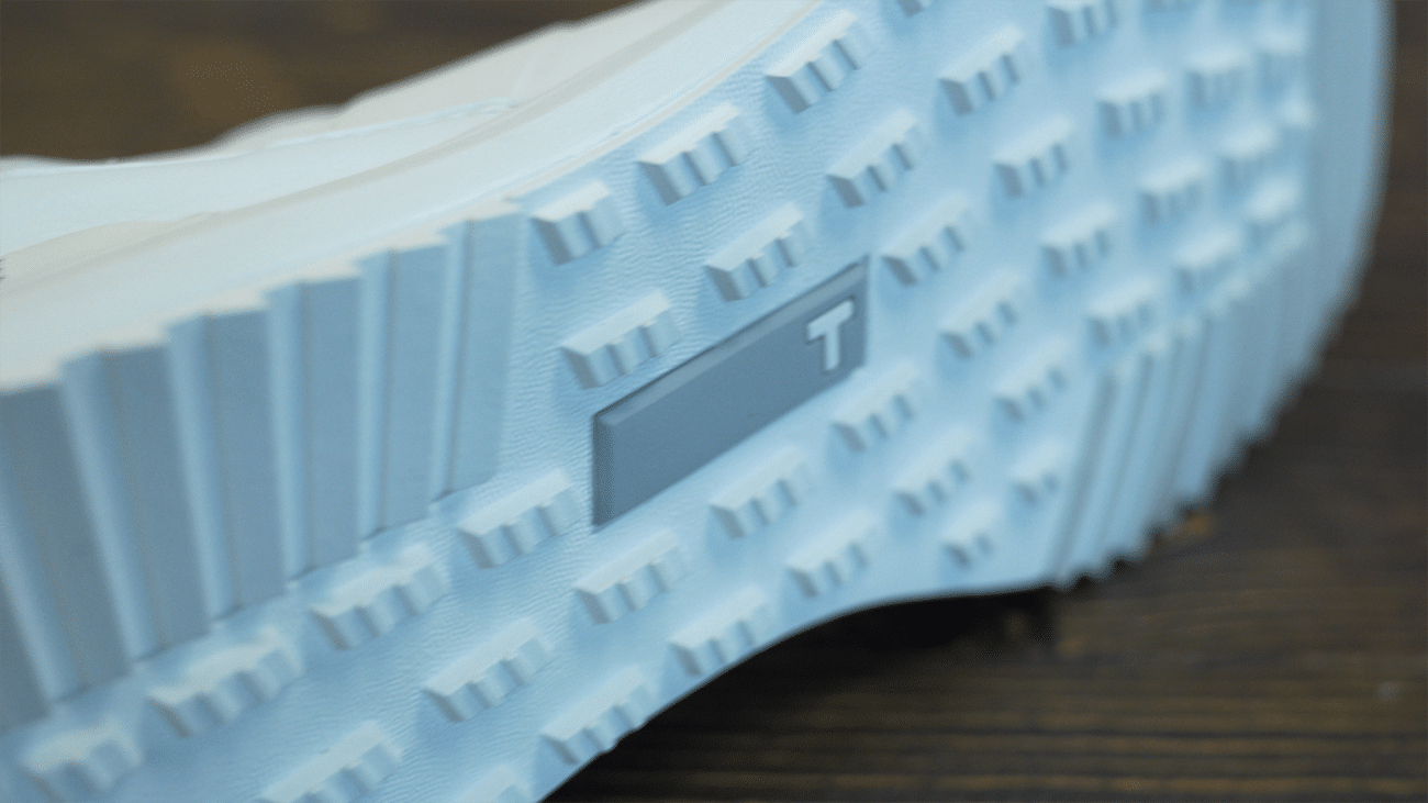 Close-up of white shoe sole tread pattern