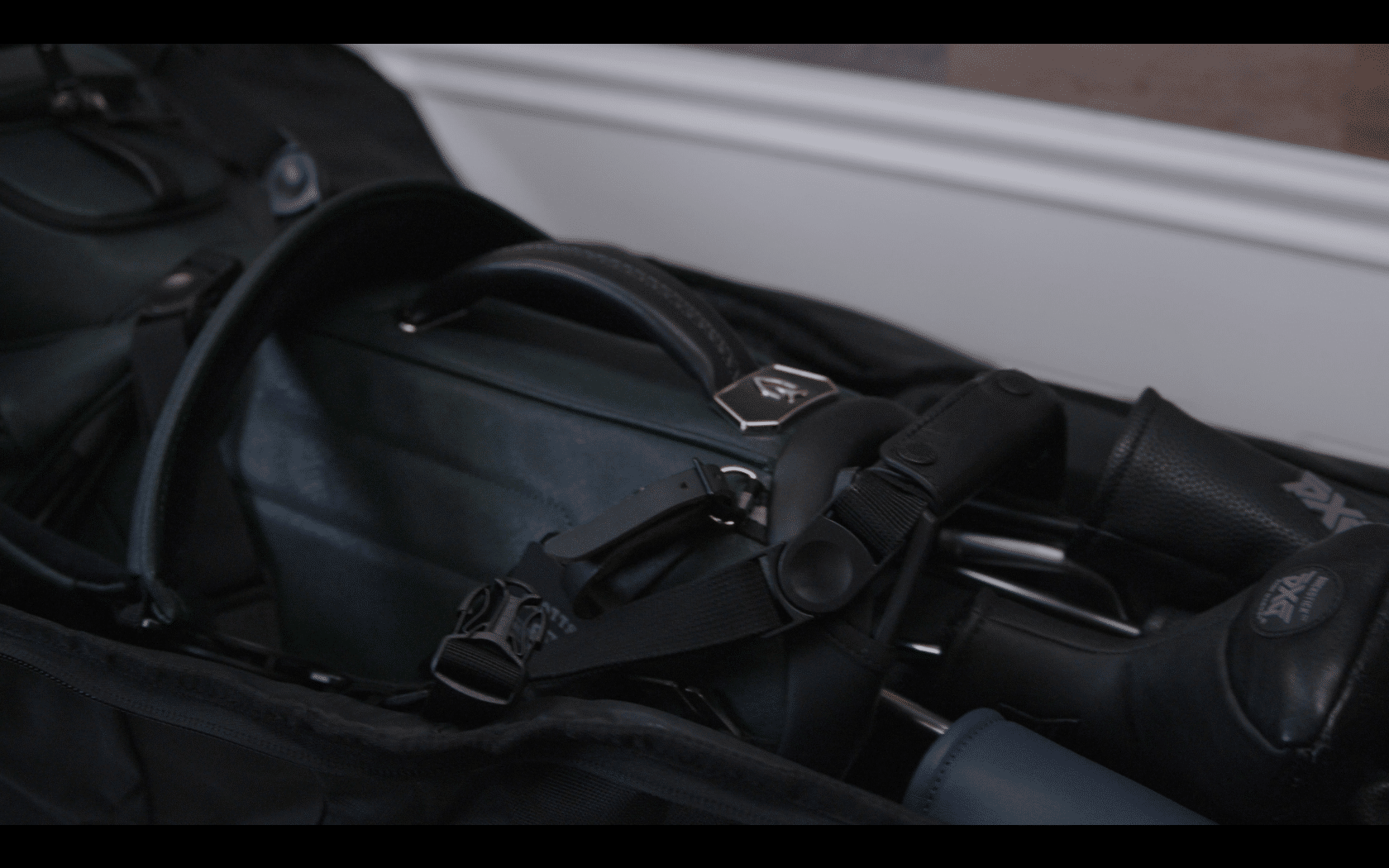 Golf bag with clubs and travel case