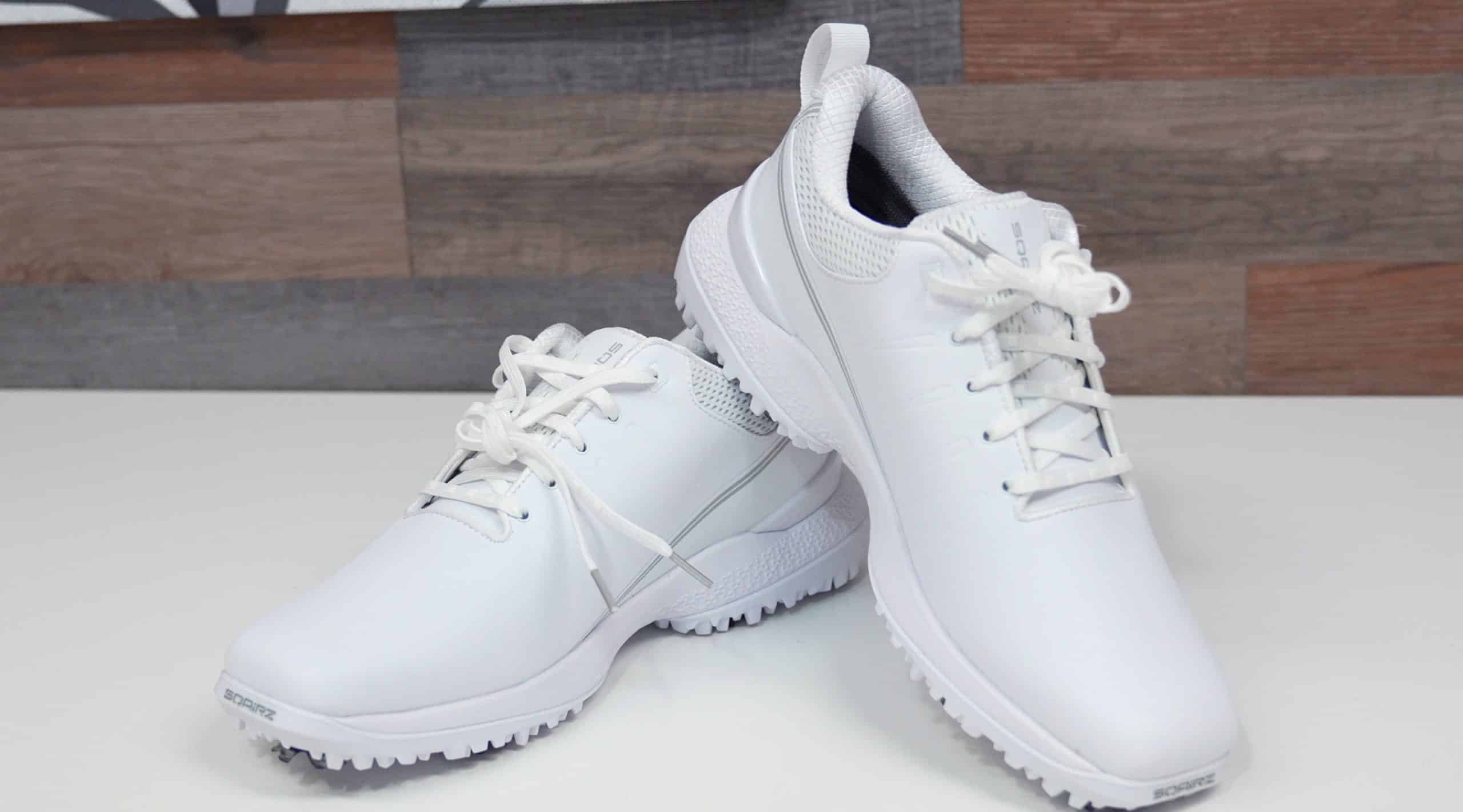 White athletic shoes with textured soles