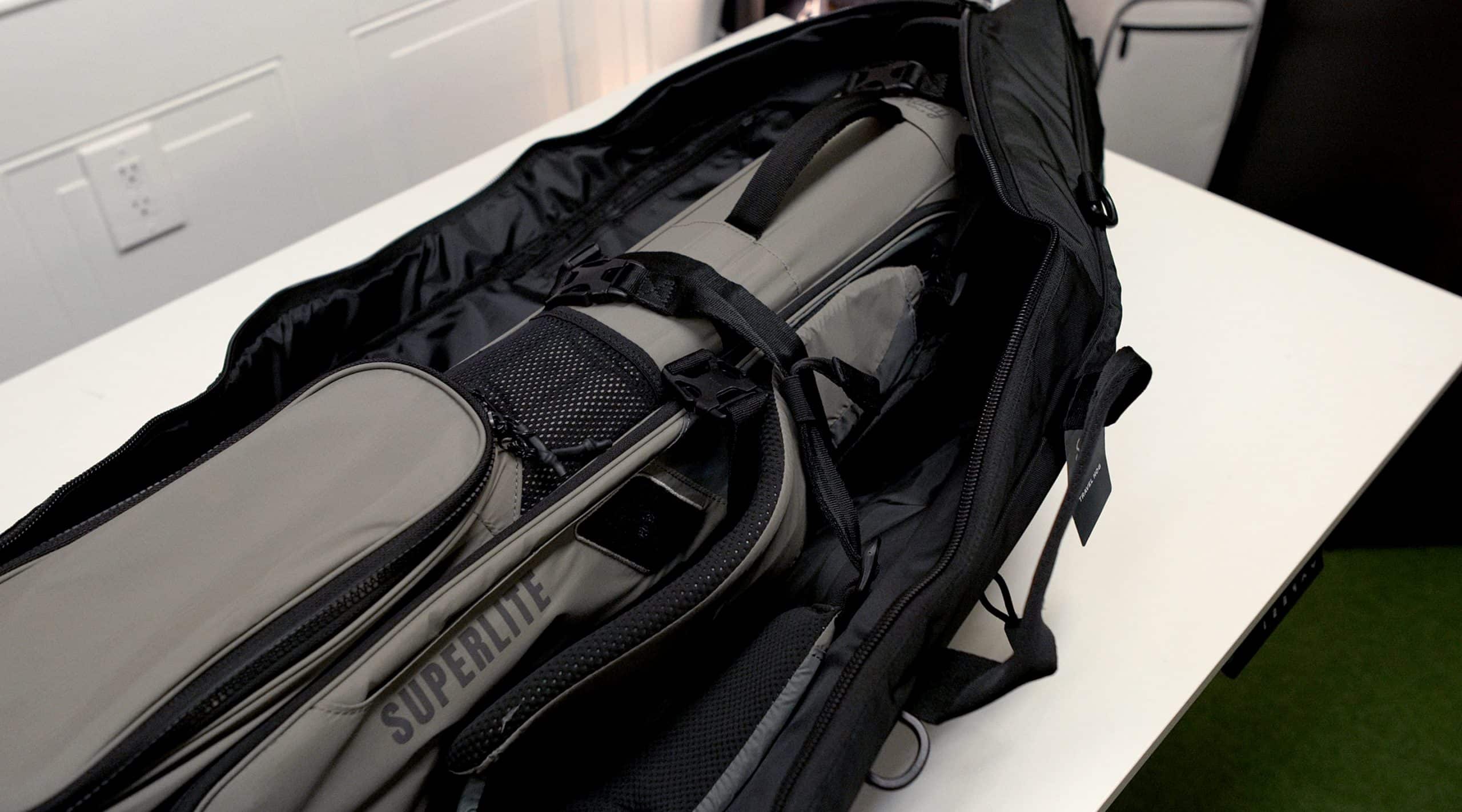 Travel golf bag packed inside black case