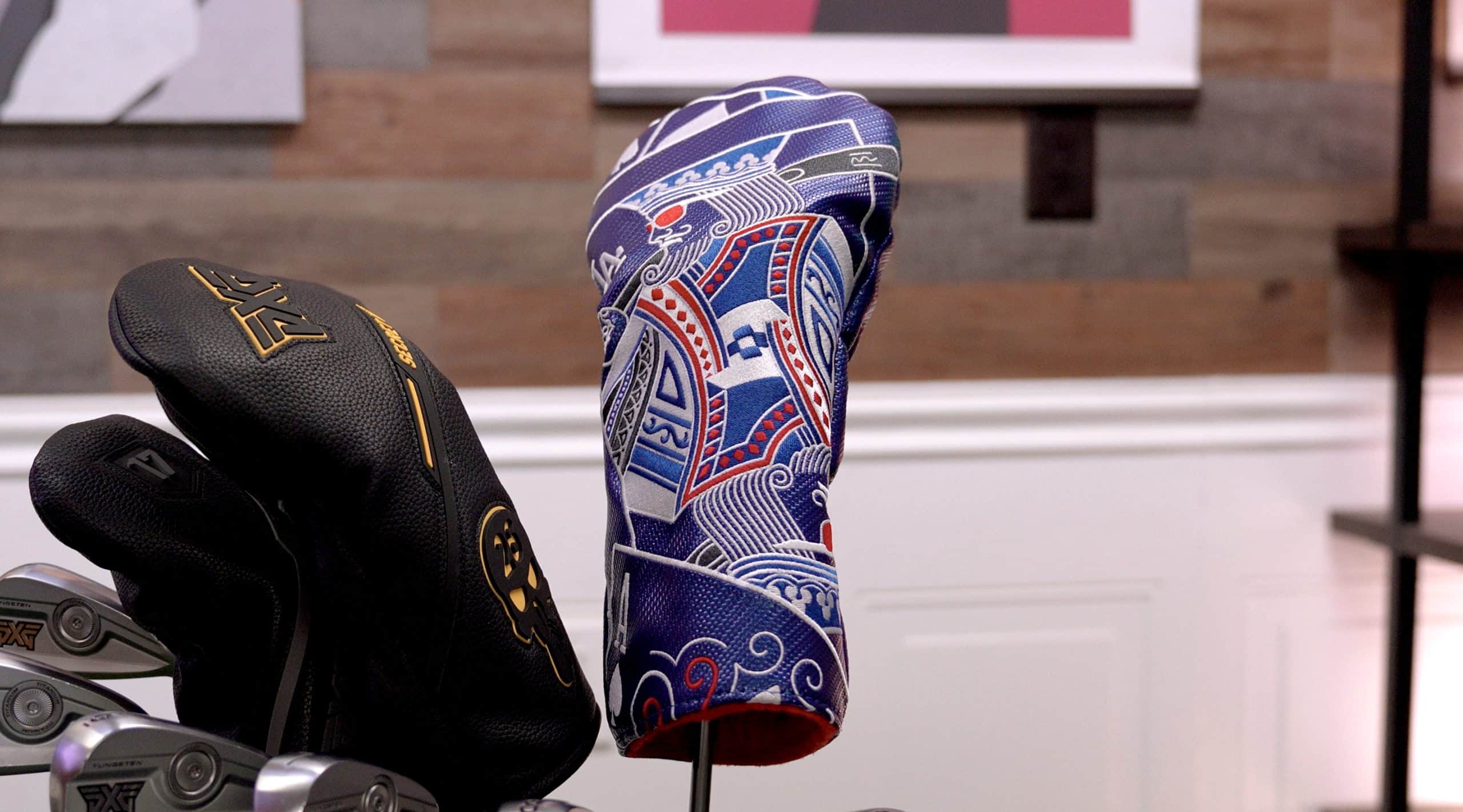 Colorful golf club headcovers on golf clubs