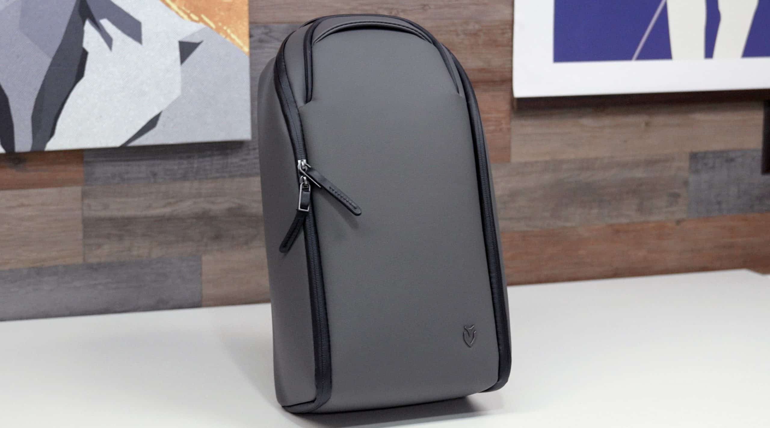 Sleek gray modern backpack on white desk