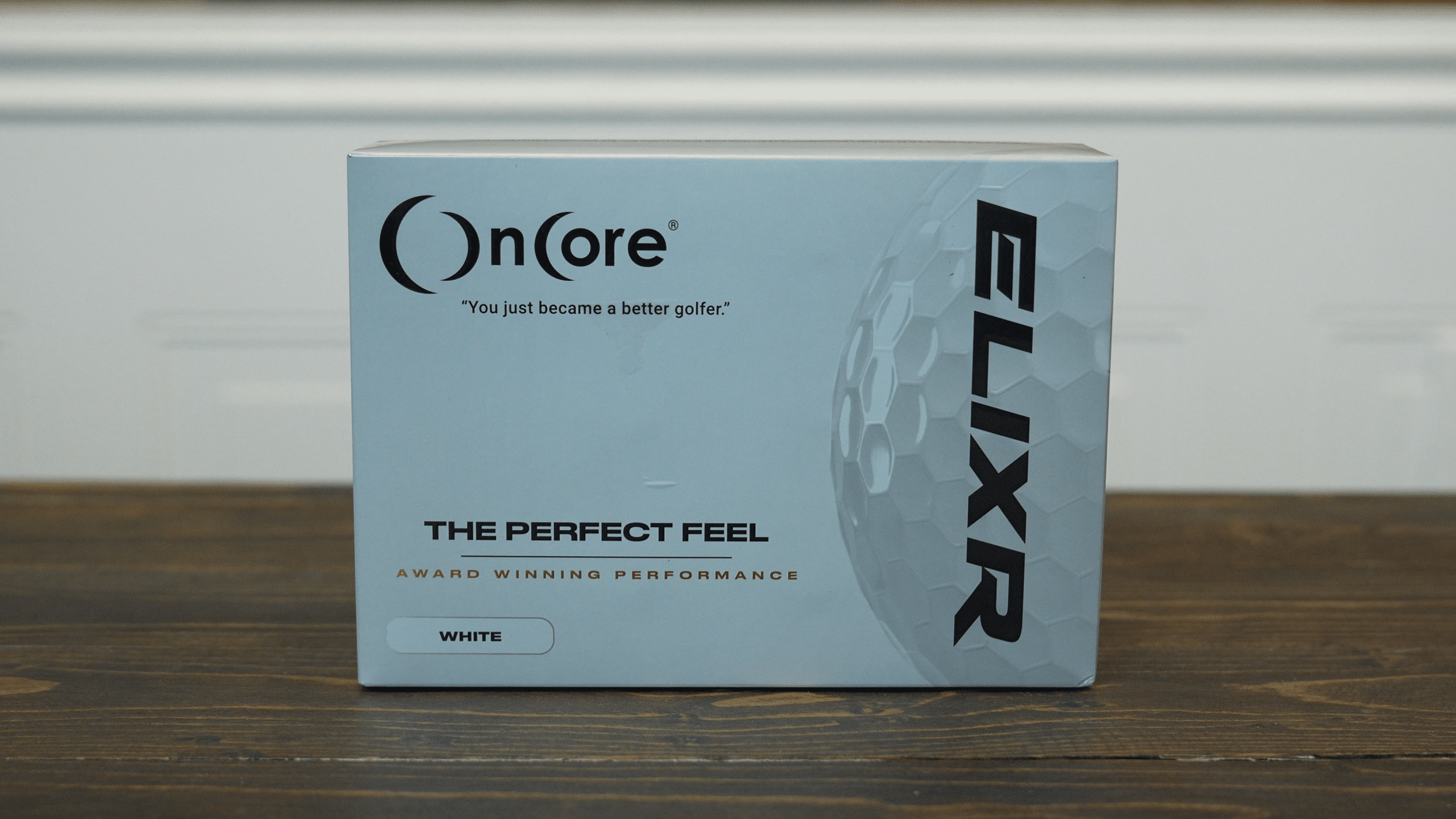 OnCore ELIXR golf balls box on table