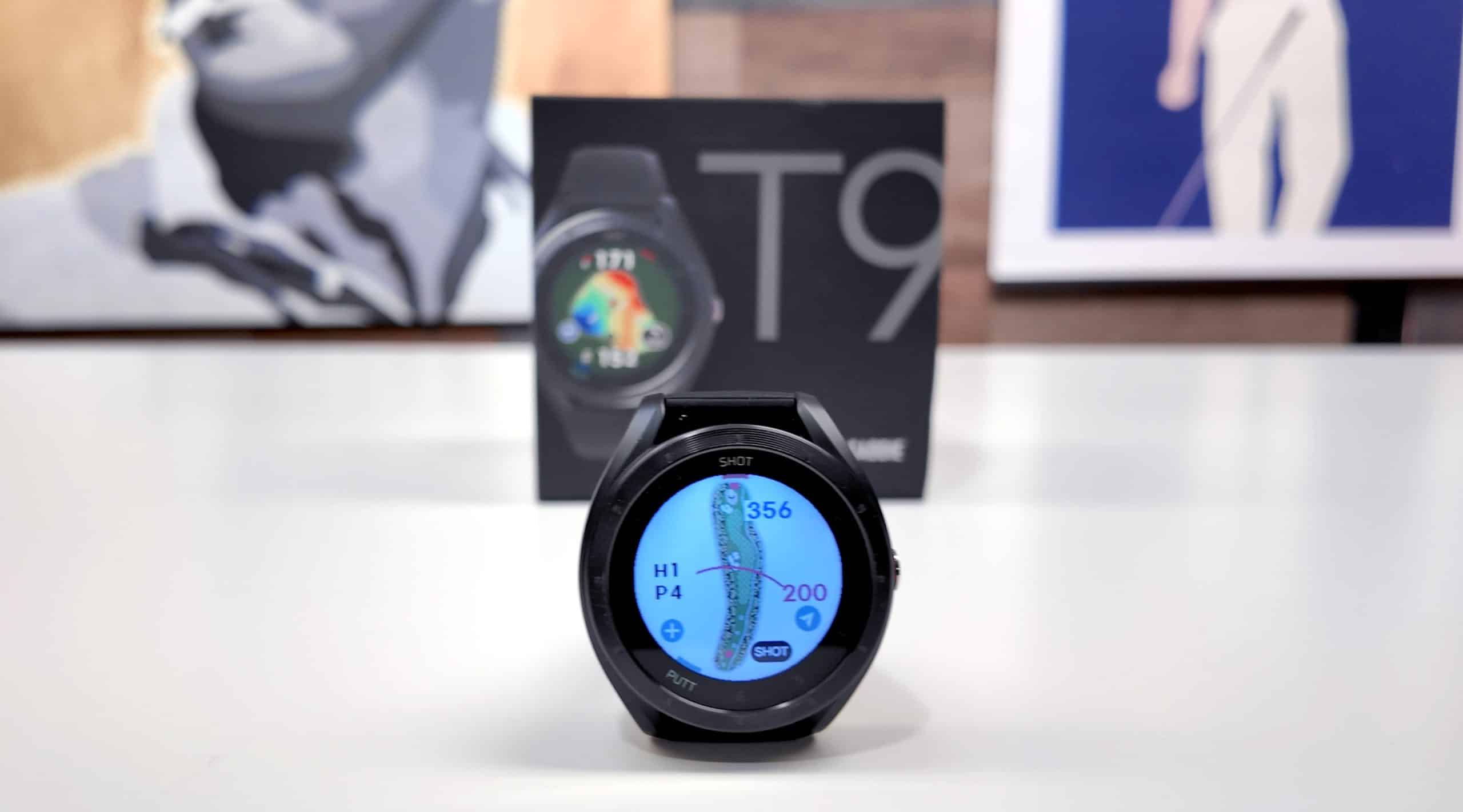Black T9 smartwatch on a white table