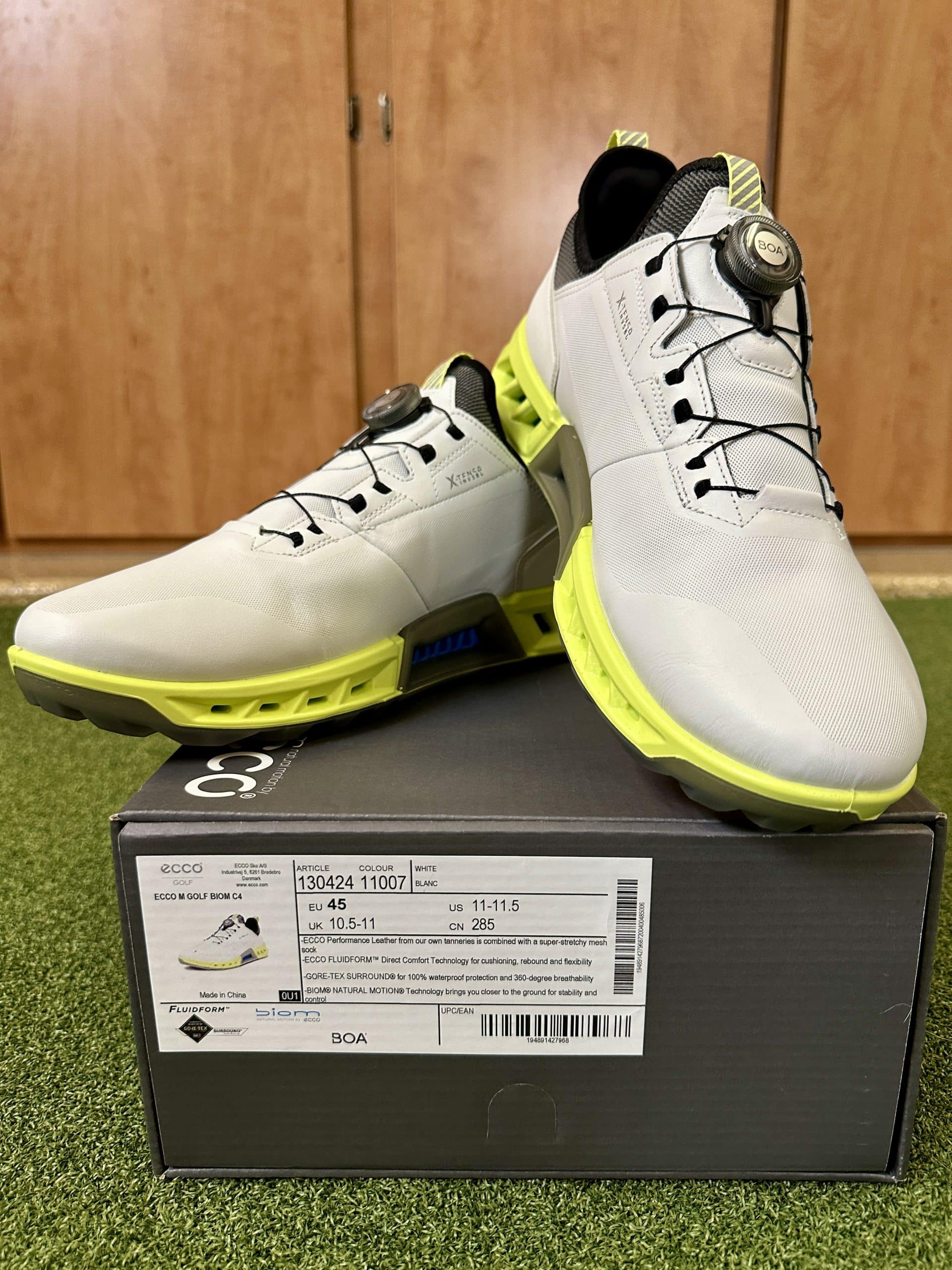 Ecco white golf shoes on box