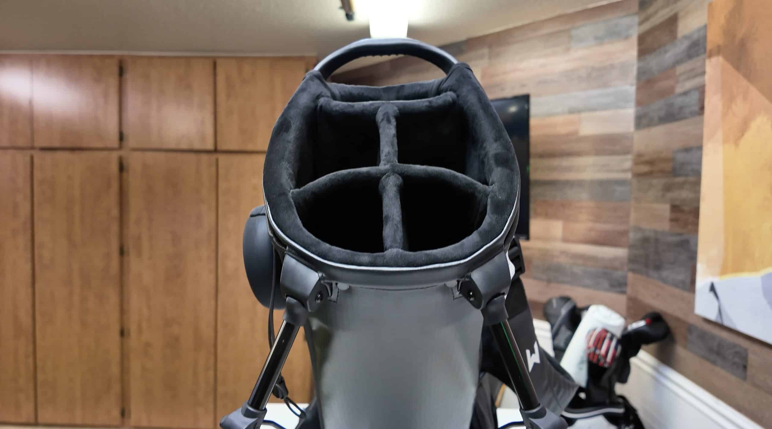 Empty golf bag with club dividers