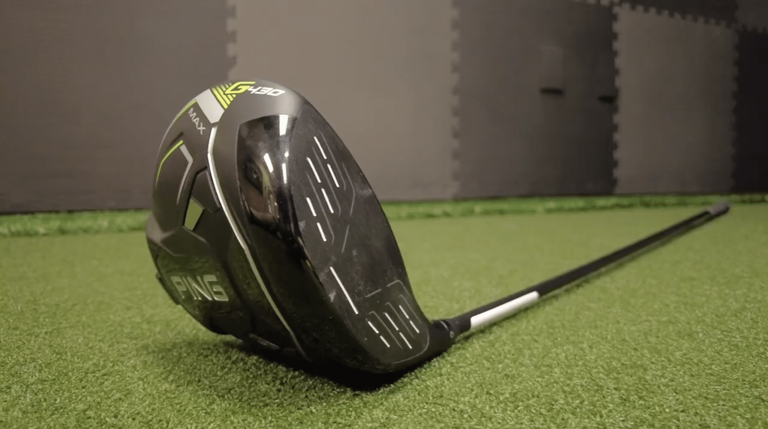 Ping G430 Max golf driver on turf