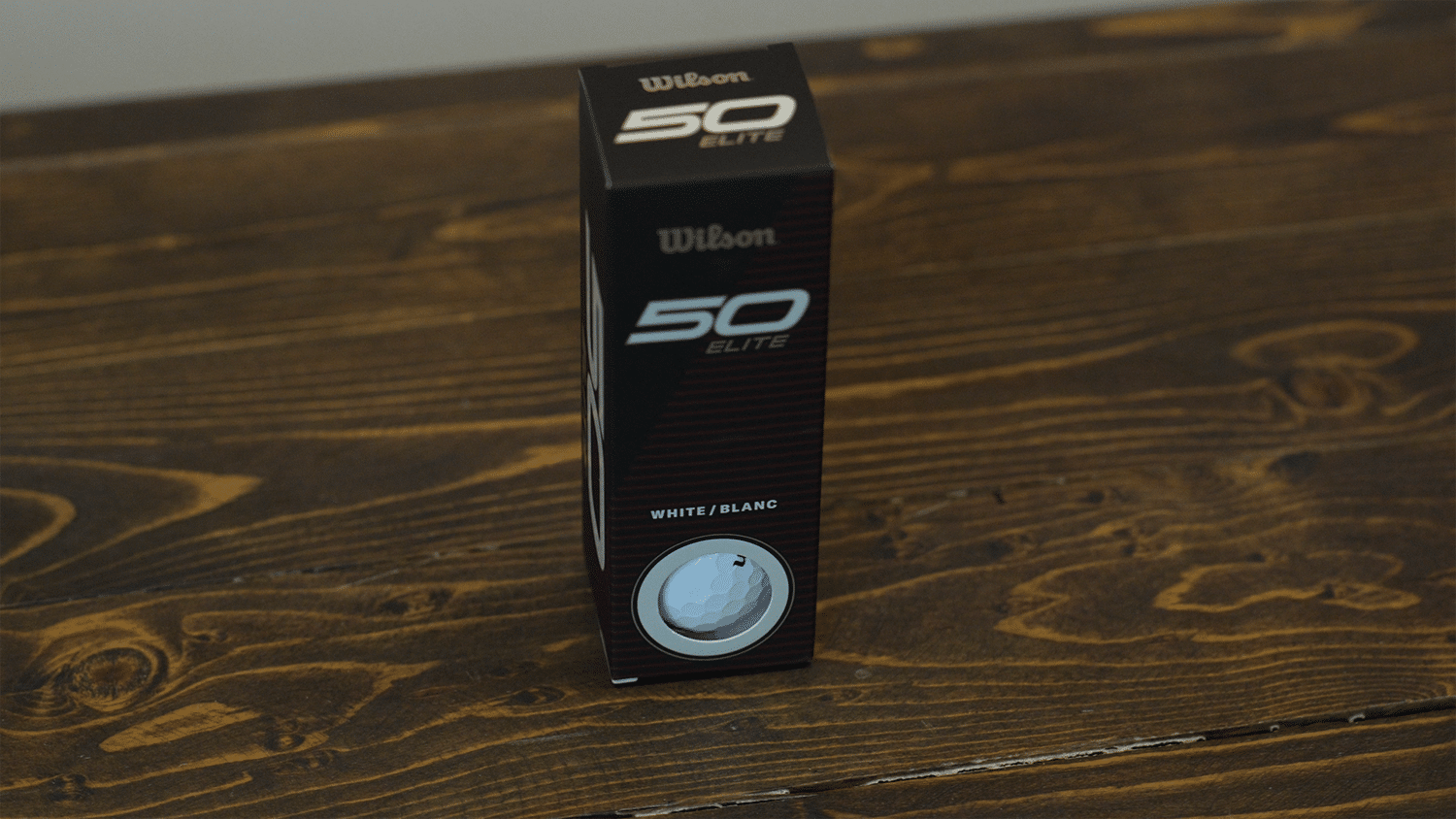 Wilson 50 Elite golf balls box on table