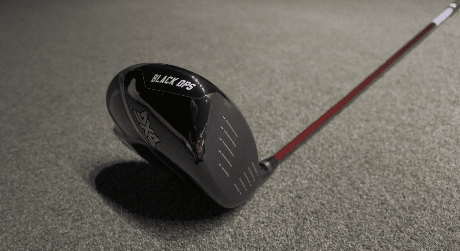 Black Ops golf driver on green turf