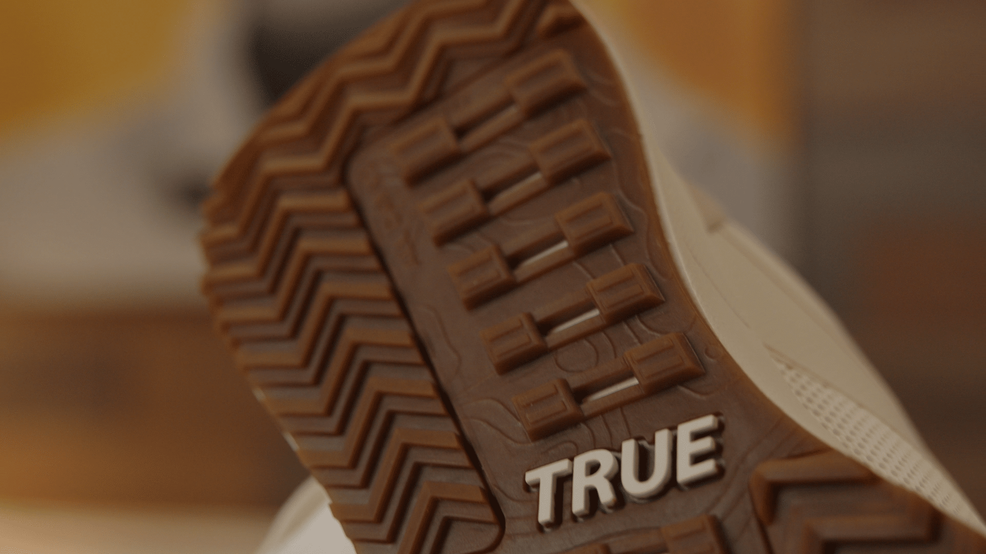 Close-up of shoe sole with TRUE branding