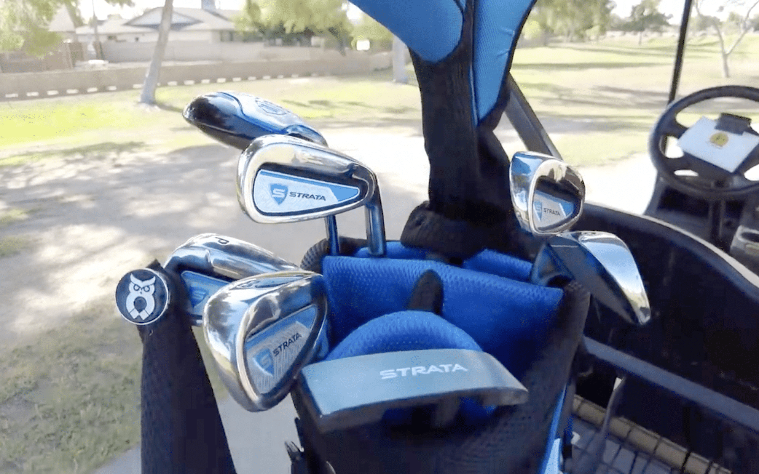 Strata golf clubs in blue golf bag