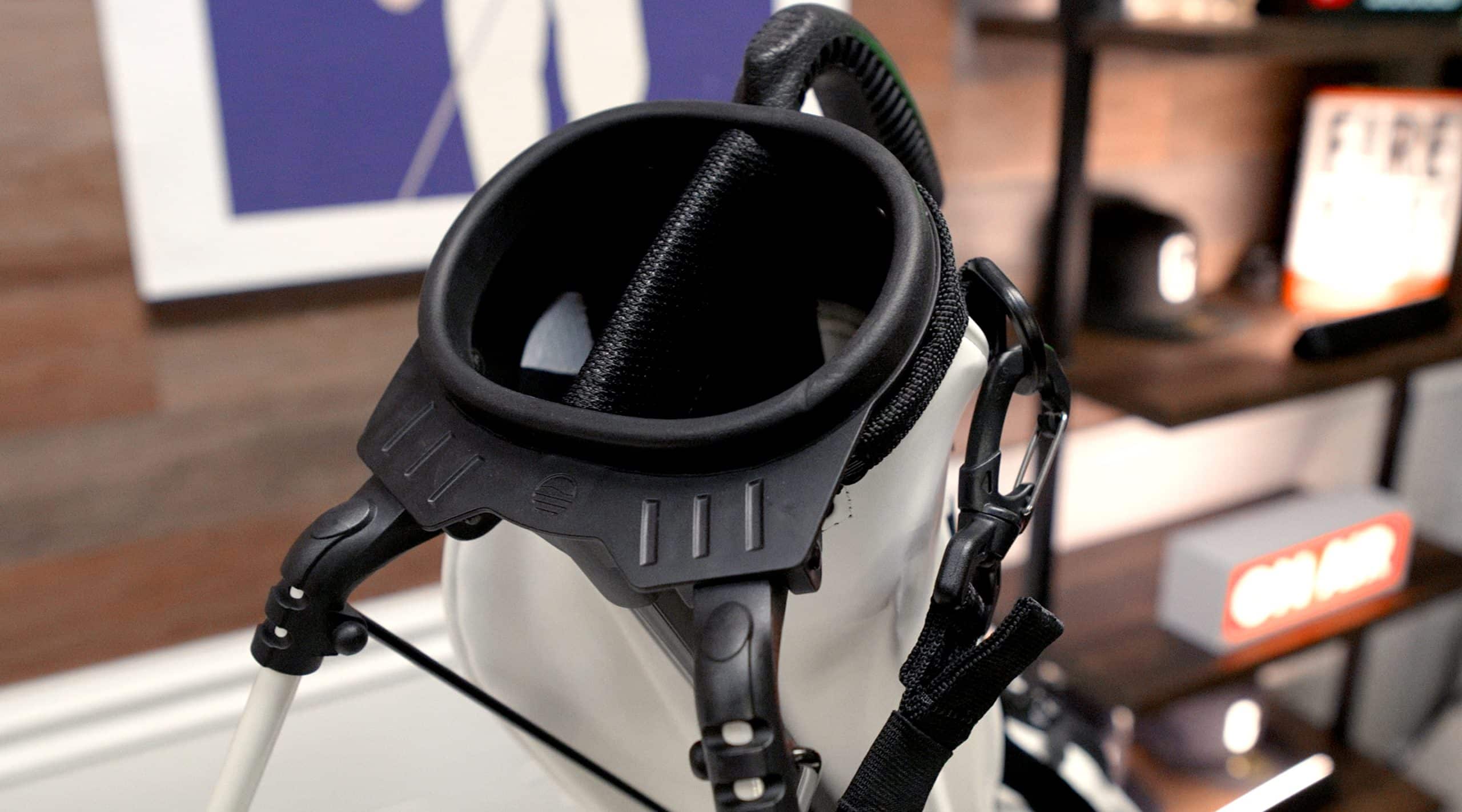 Golf bag with attached stand and straps