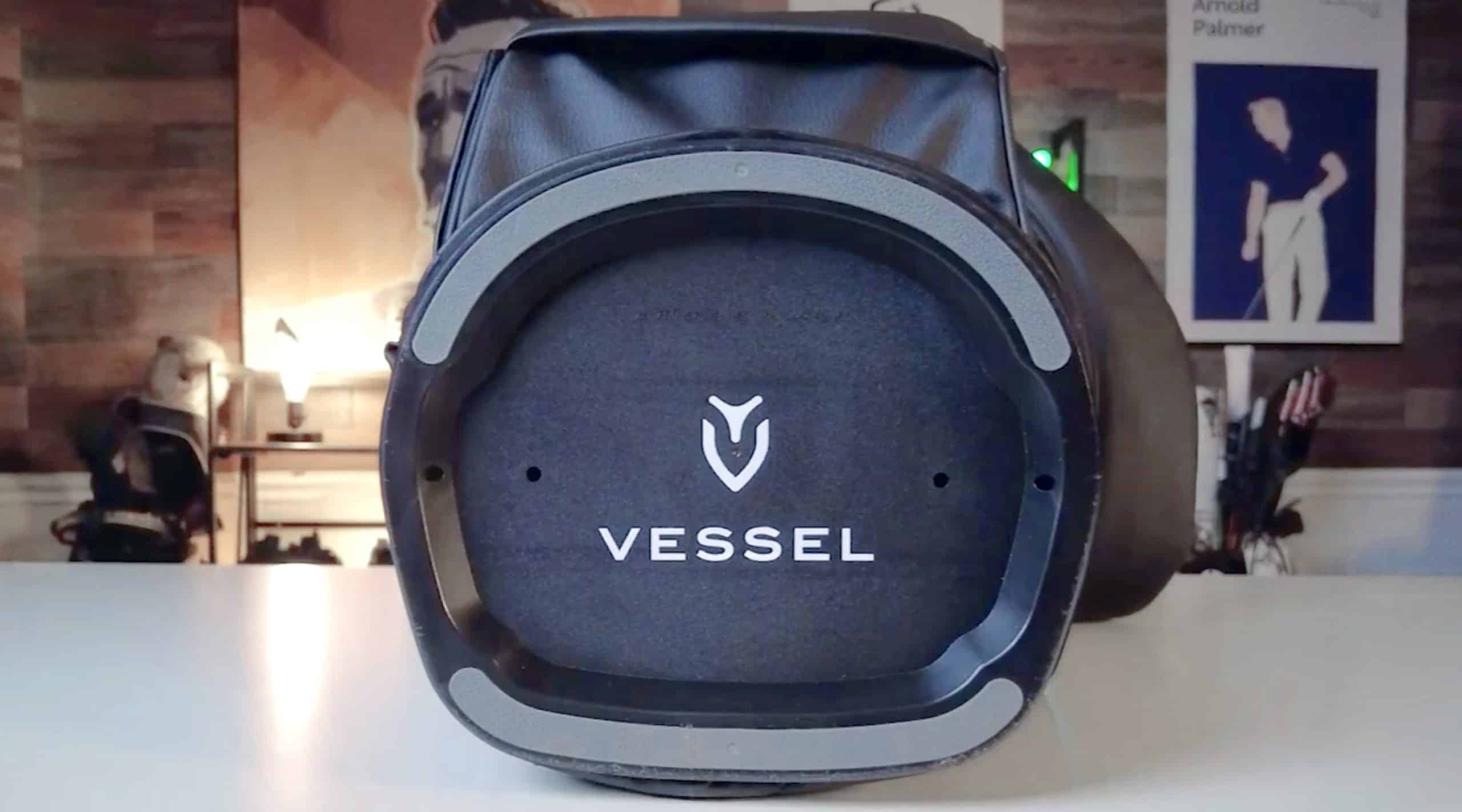 Vessel golf bag base on table