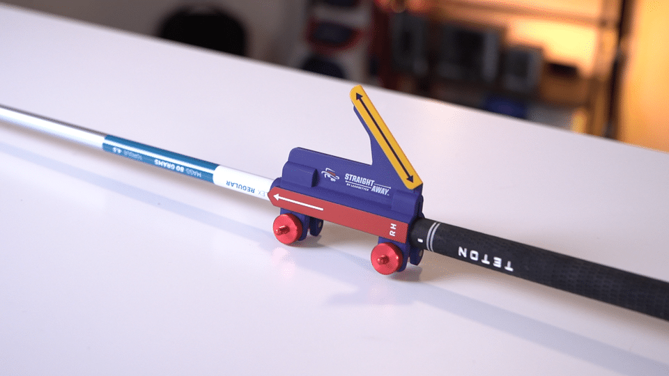 Golf swing training aid on golf club shaft