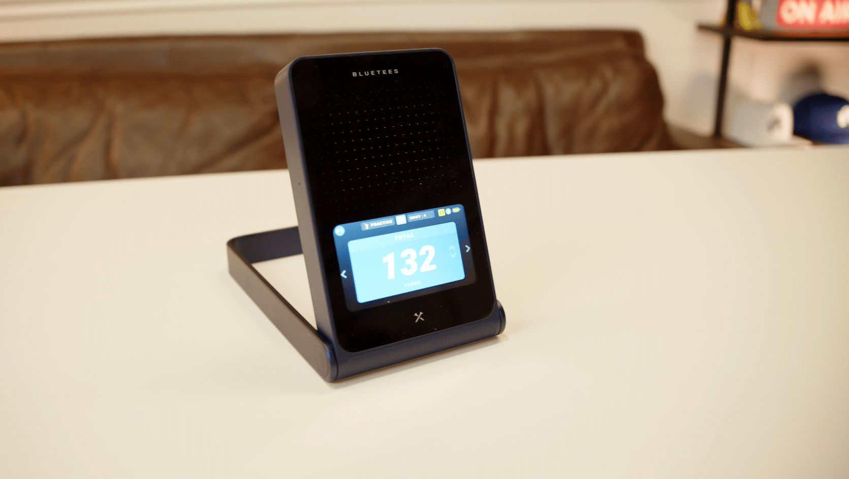 BlueTees golf launch monitor showing 132 yards